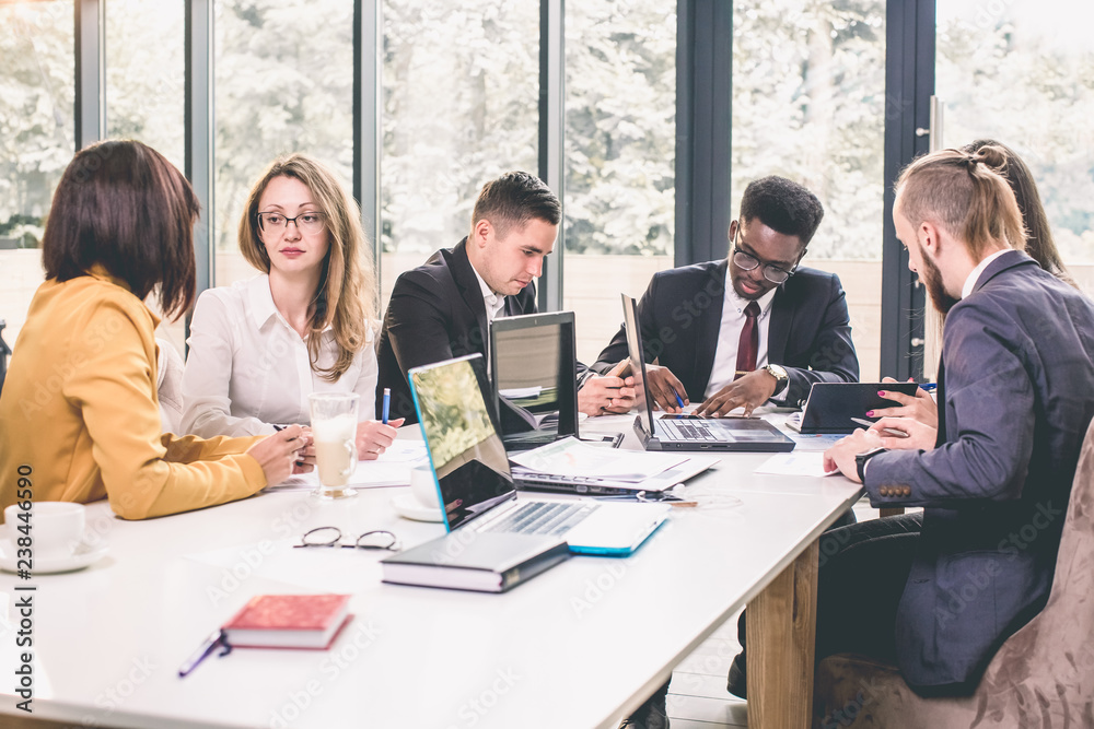 Happy working business team in modern office Happy working business team in modern office
