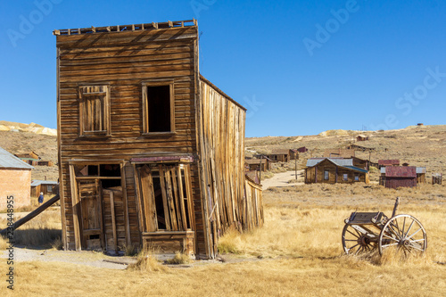 Old abandoned building and cart at Bodie ghost town, California