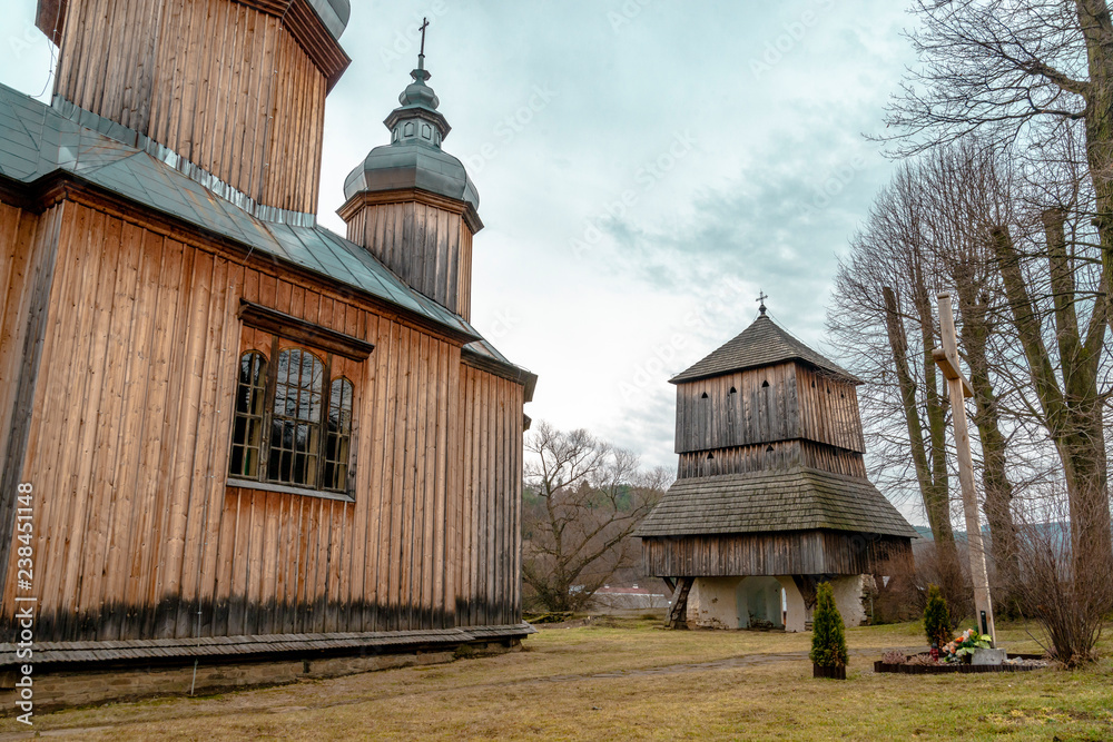 Fototapeta premium typical wooden church in village near Sanok town. Southern Poland