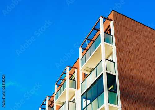 Facade of the modern apartment house with copy space