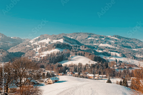 Landscape with Alps Mountains Gruyeres town village winter