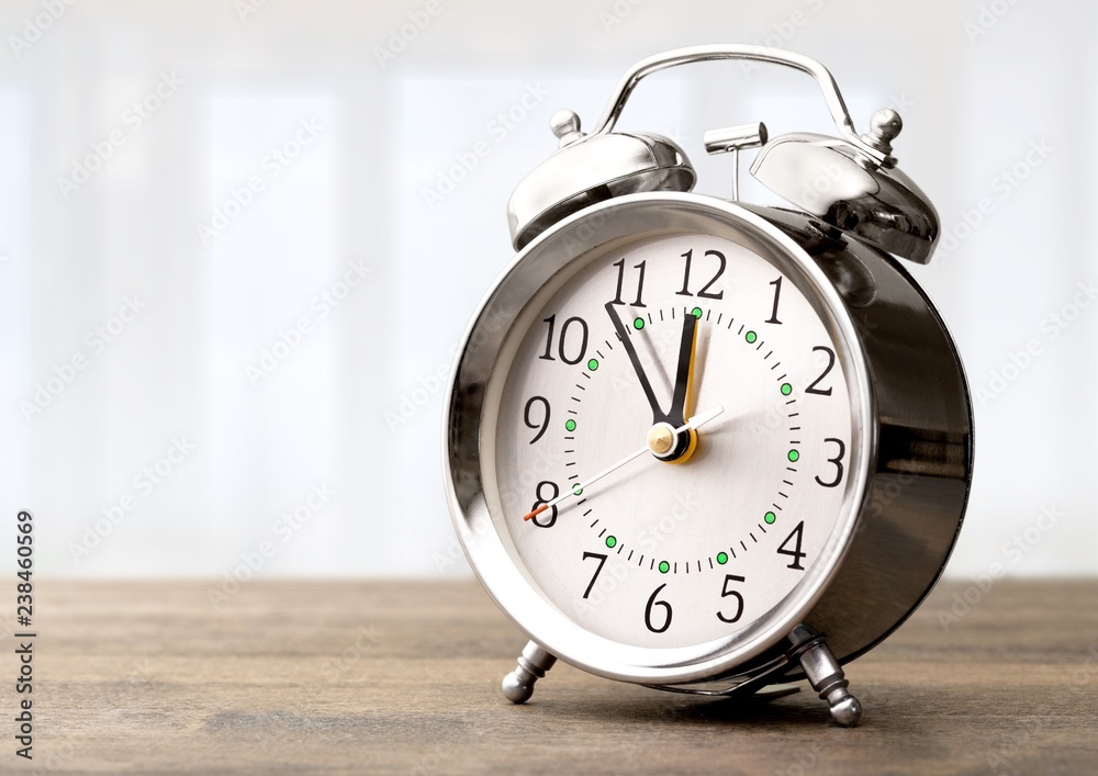 Retro alarm clock on background Retro alarm clock on background