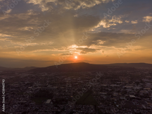 DRONE: SUNSET IN THE CITY AND HILLS