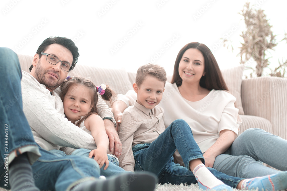 happy family rests in the living room on a free evening happy family rests in the living room on a free evening