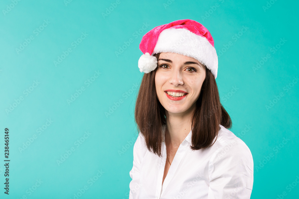 New Year theme Christmas winter holidays office of company employees. portrait young caucasian woman businessman white shirt in funny santa claus hat posing emotion joke, joy happiness laugh grimace. New Year theme Christmas winter holidays office of company employees. portrait young caucasian woman businessman white shirt in funny santa claus hat posing emotion joke, joy happiness laugh grimace.