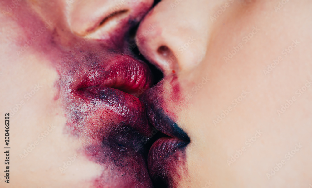 Lesbian kiss extremally closeup. Close up macro portrait of female part of  face. Human woman lips