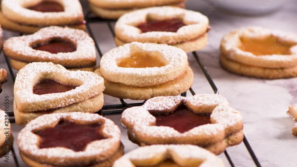 Homebaked Christmas Cookies With fruit Jam filling and Icing Sugar.