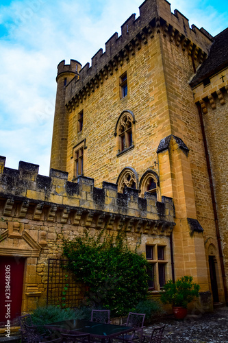 Facade of the Chateau de Puymartin in the Dordogne region of France 