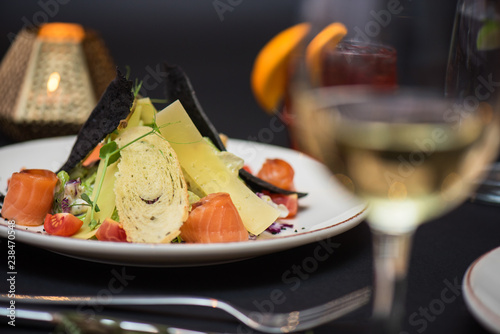 Caesar salad with salmon fi...