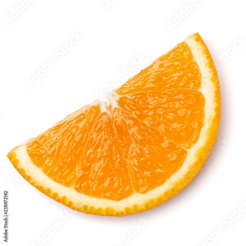 Orange fruit slice isolated on white background closeup. Food background. Flat lay, top view.