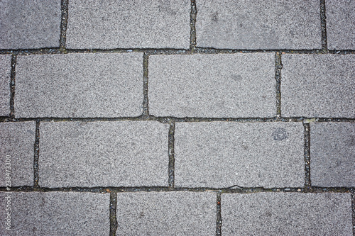 Background of sett. Cobblestone pavement. Texture.