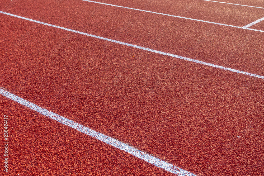 Red running track in stadium