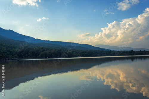 Scenic view of the reservoir Huay Tueng Tao with Mountain range forest at evening sunset in Chiang Mai, Thailand © Thinapob
