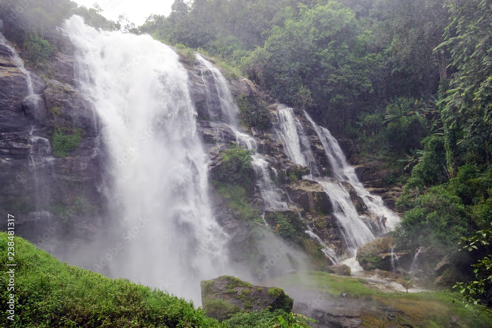 Beautiful waterfall with stones in forest, Thailand Beautiful waterfall with stones in forest, Thailand