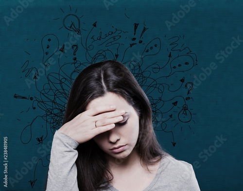 Young woman with worried stressed face.