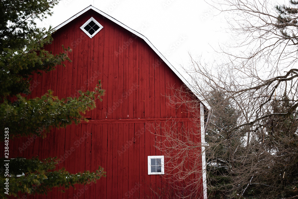 An old red barn in the mid-west winter An old red barn in the mid-west winter