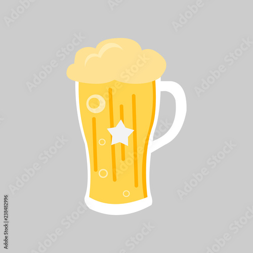 glass of beer with foam isolated on grey background