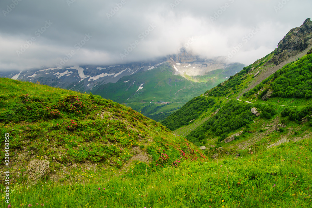 Alpine peaks landskape background. Jungfrau, Bernese highland. Alps, tourism, journey, hiking concept.