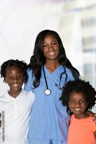 Nurse With Children At Hosp...