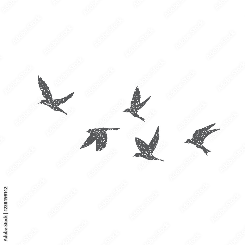 birds in flight silhouette tattoo
