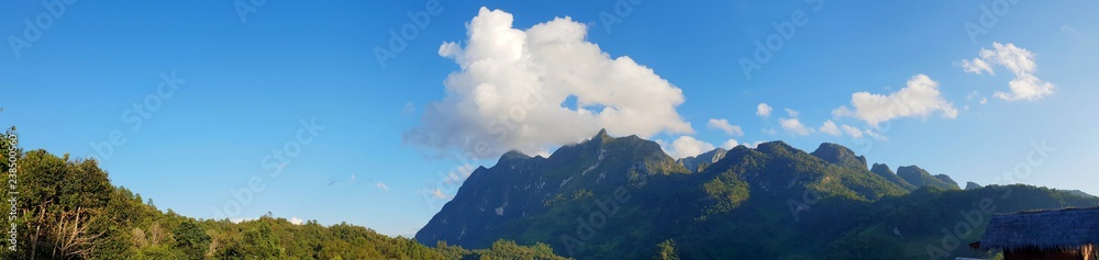 Panoramic view for landscape on mountain with sky and cloud, peace and relaxation, Beautiful nature to make our mind calm, copy space, Doi Chiang Dao at Thailand Panoramic view for landscape on mountain with sky and cloud, peace and relaxation, Beautiful nature to make our mind calm, copy space, Doi Chiang Dao at Thailand