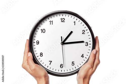 clock in hands isolated on white