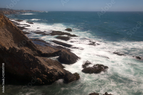 waves crashing on rocks