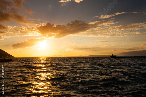 Admirabale sunset at sea with rays of sunshine