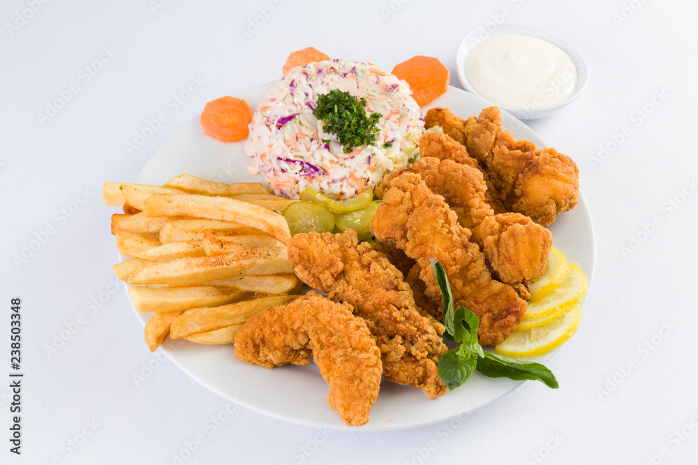 Chicken Tenders with Fries and salad Chicken Tenders with Fries and salad