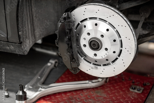 Disk of a luxury sports car at the car service