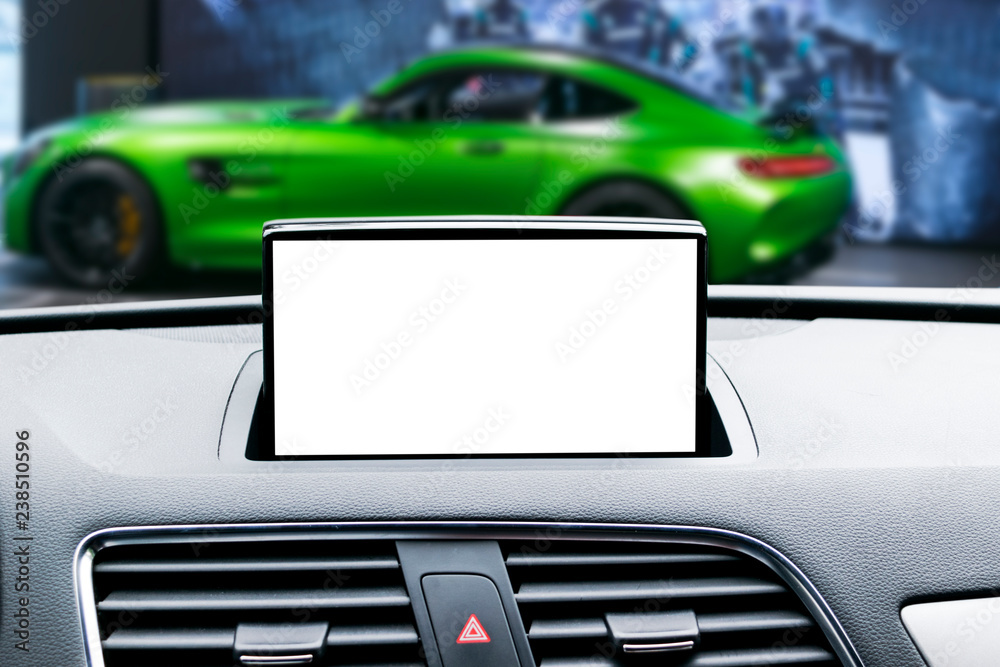 Monitor in car with isolated blank screen use for navigation maps and GPS. Isolated on white with clipping path. Car detailing. Modern car interior details.