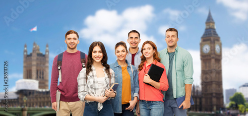 Canvas Print education, high school and people concept - group of smiling students with books