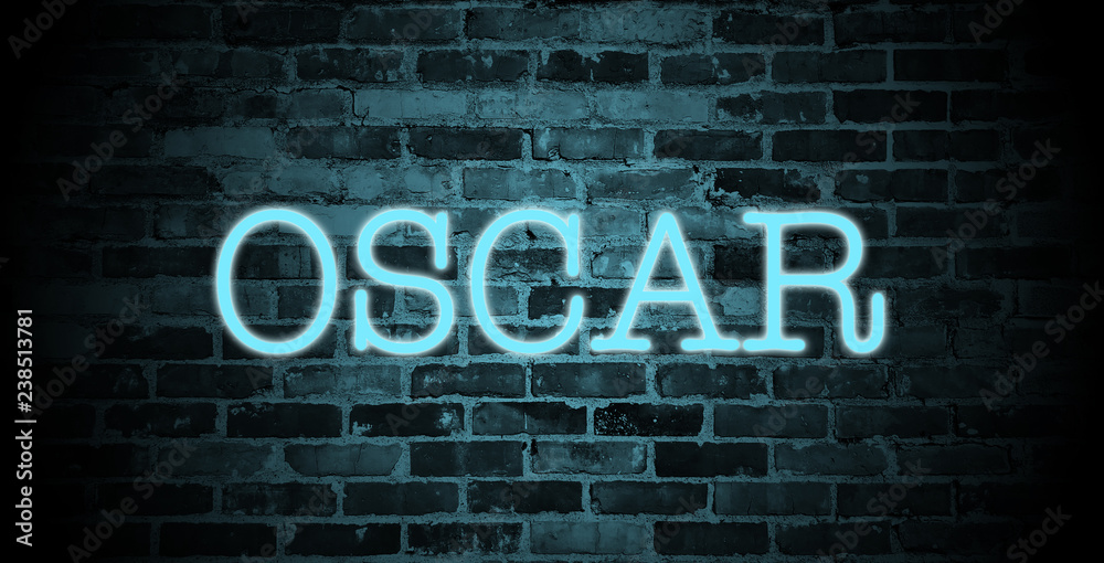 Obraz premium first name Oscar in blue neon on brick wall