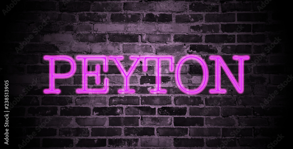 Obraz premium first name Peyton in pink neon on brick wall