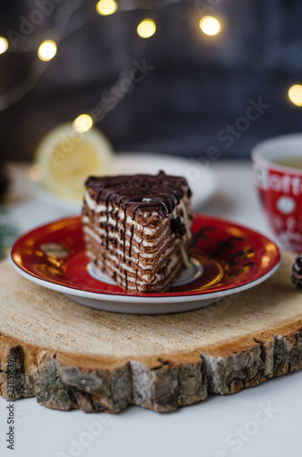chocolate cake with hot tea and lemon