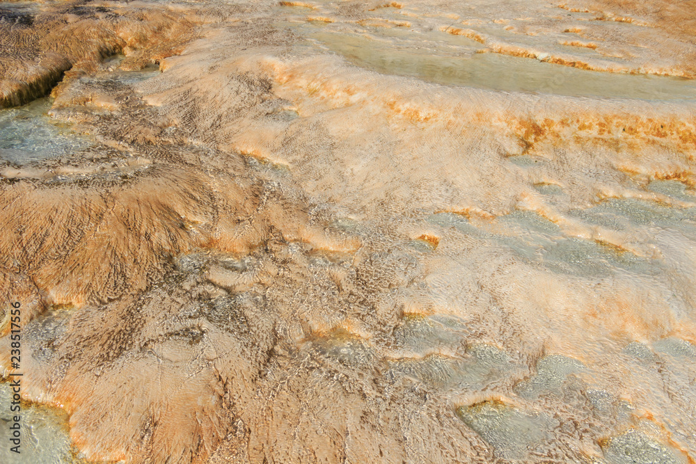 Geothermal sources and limestone deposits on the hillsides