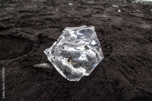 Crystal ice on black diamond beach, Iceland photo