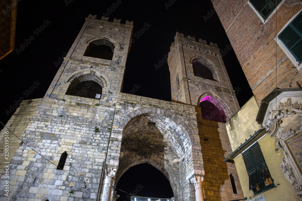 GENOA, ITALY, NOVEMBER 24, 2018 - View of Porta Soprana or Saint Andrew's Gate by night in Genoa, Italy