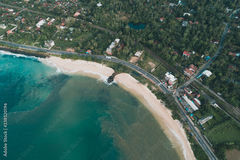 Aerial view of beautiful tropical coastline and fisherman village