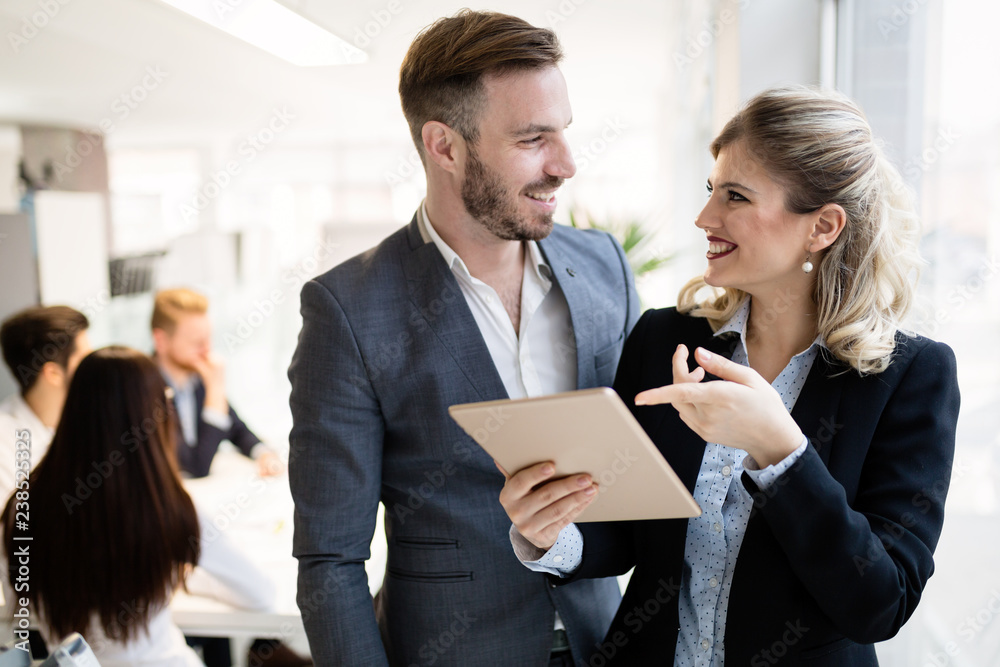 Picture of handsome man and woman as business partners Picture of handsome man and woman as business partners