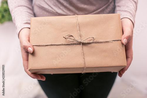 Hand holding a gift box