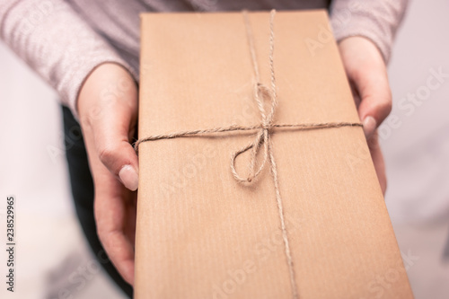 Hand holding a gift box