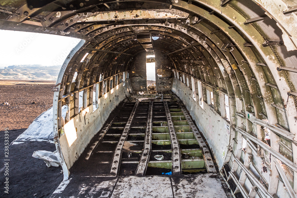 Inside the DC-3 plane wreck in Iceland at morning time Inside the DC-3 plane wreck in Iceland at morning time