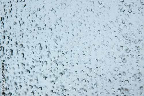 texture of water droplets on a double pane or window. abstraction background. for design and decoration. defocused drops. Blurred