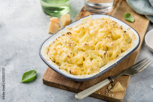 cauliflower and cheese gratin in baking dish photo