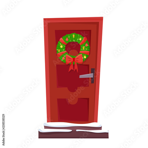 Christmas red door with wreath, snow and fir.