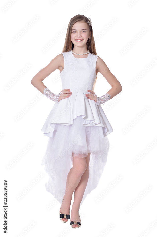 Happy little girl in carnival costume on white background