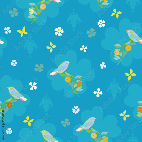 Blue vector repeat pattern with blue birdy  yellow butterfly and white blossoms. Surface pattern design.