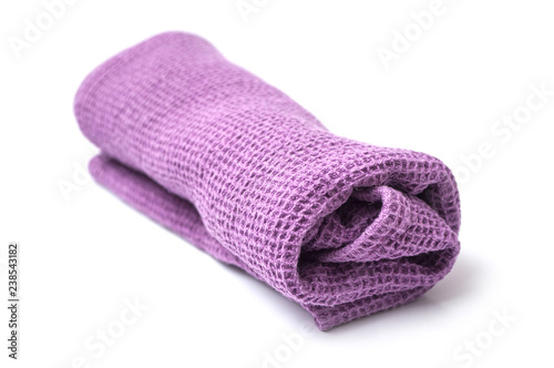 closeup of purple cleaning towel on white background