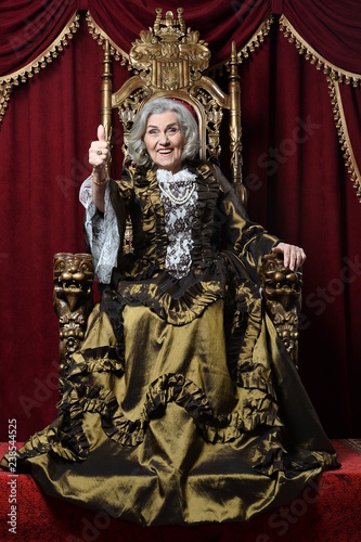 Portrait beautiful senior woman in vintage dress